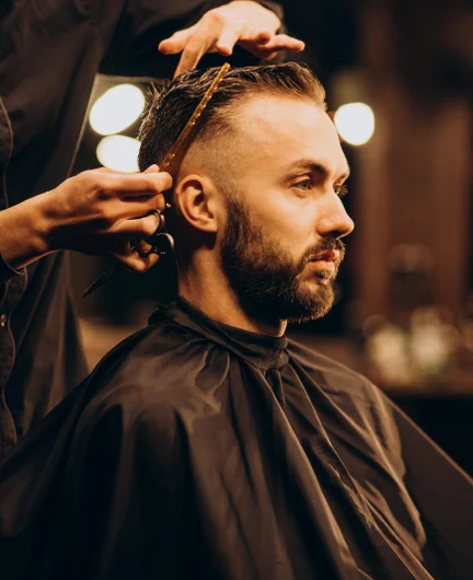 d4358822-4054-4c45-b2d3-353012f3c183-young-man-barbershop-trimming-hair.jpg